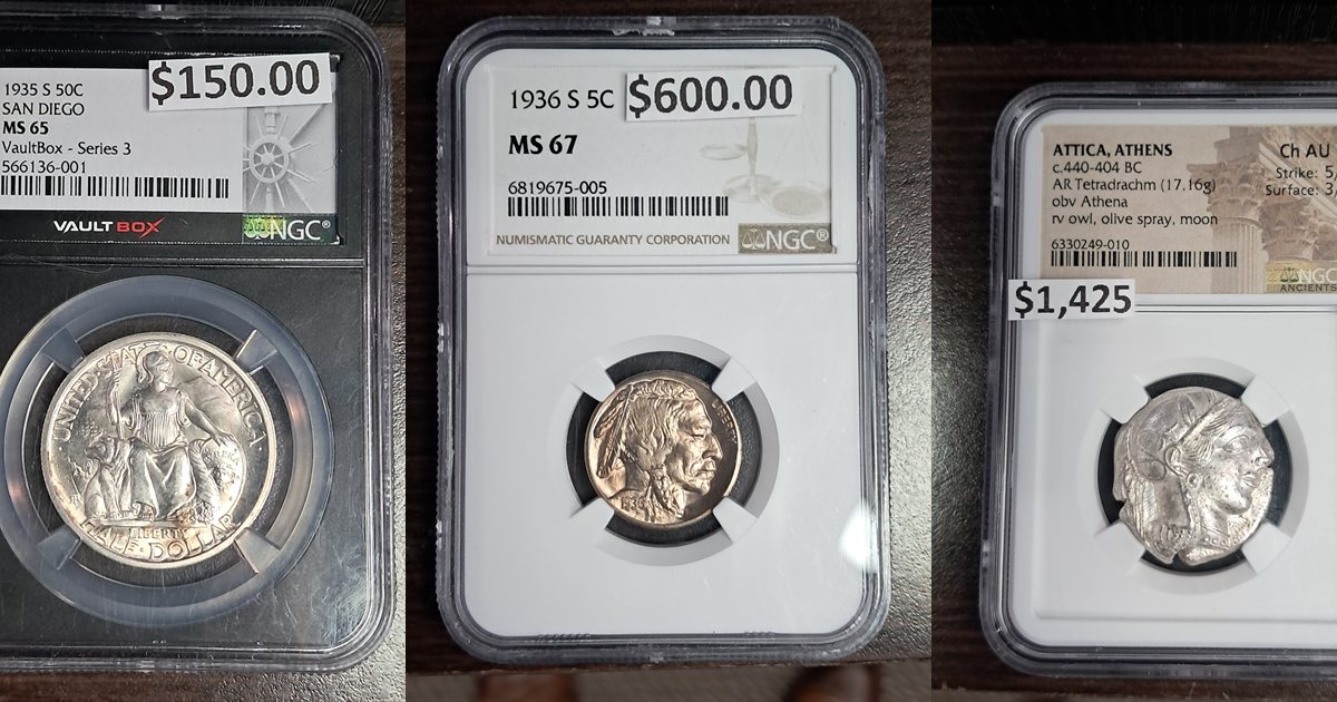 Three NGC-graded coins in the case at The Roswell Silver Dollar
